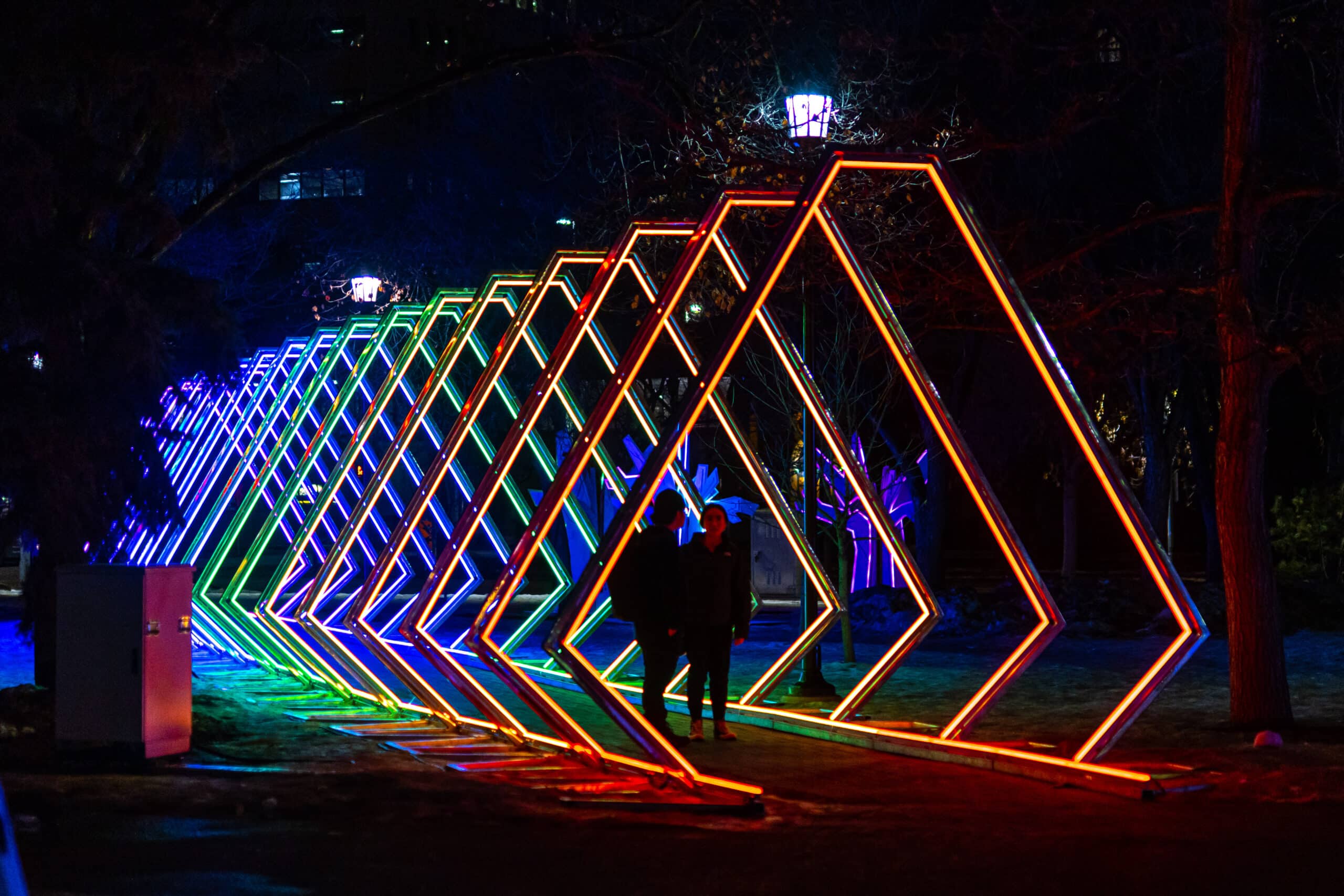 The Tunnel by BIG ART is a series of lit triangles that visitors can walk through.