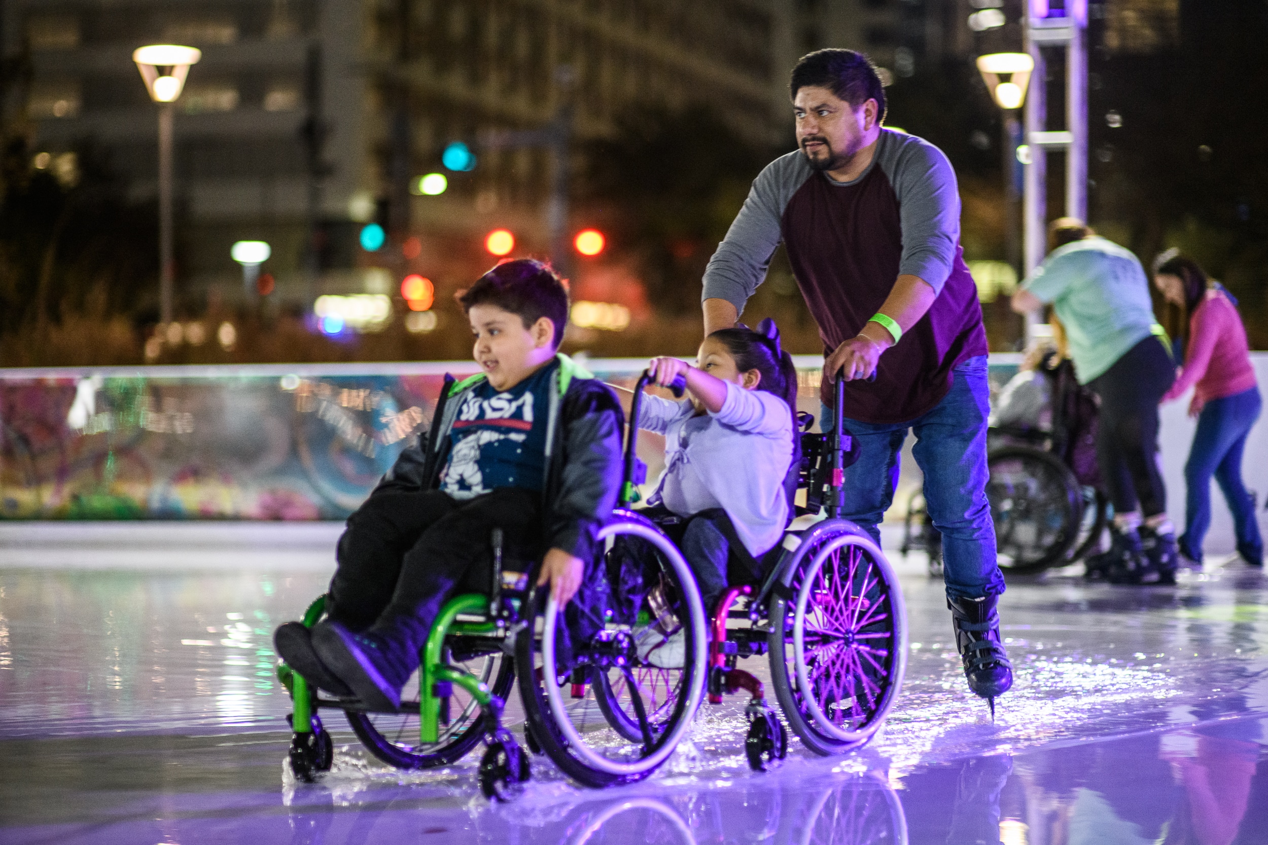 Wheelchair friendly ice skating days at Discovery Green, downtown Houston.