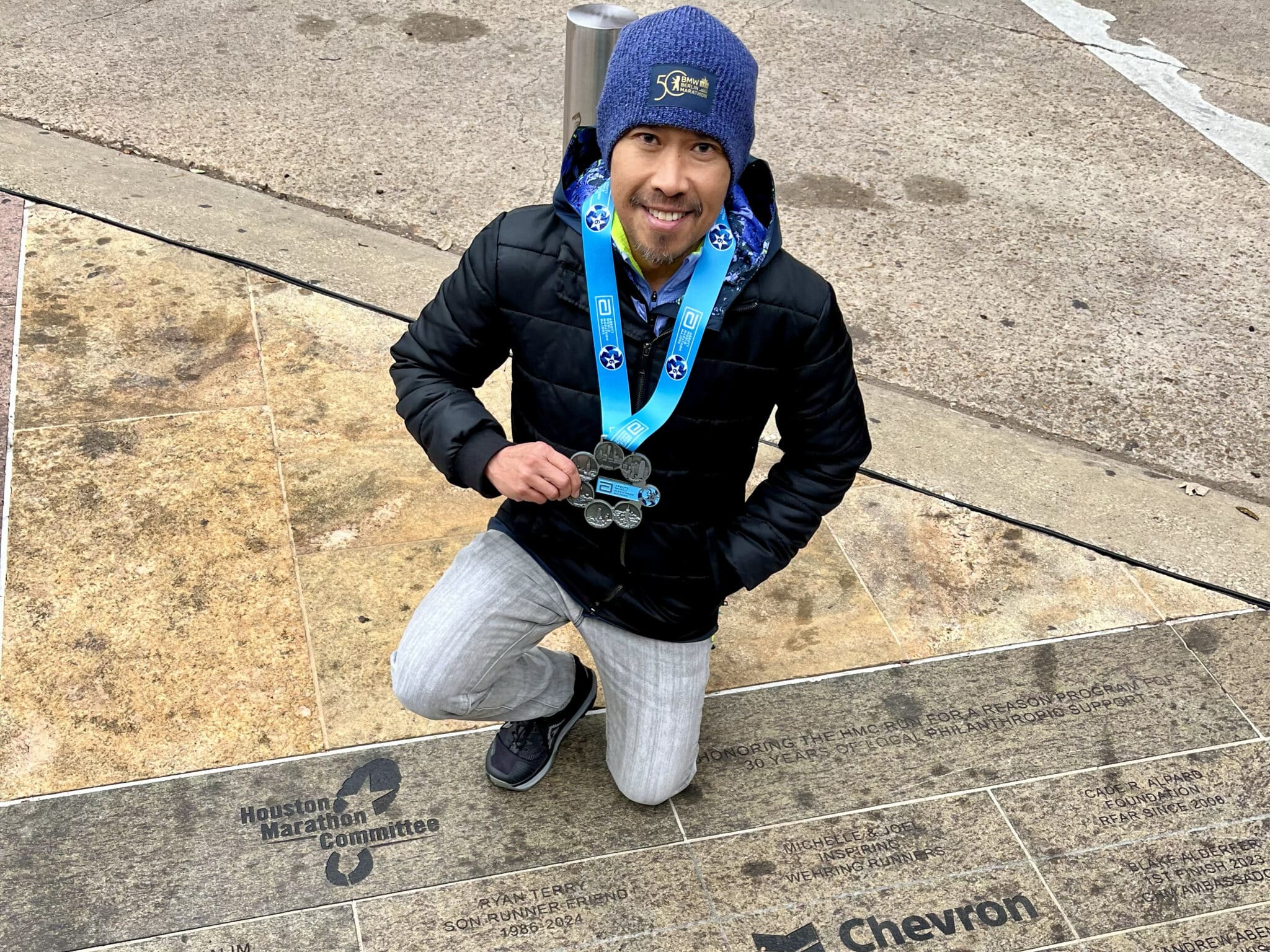 Val Parreno poses with his six-star finisher medal.